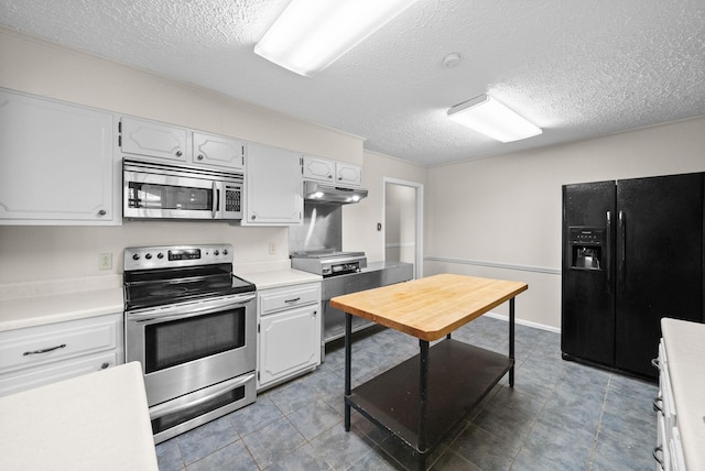 13391 Fruit Hill Red Bridge Rd, Crofton, KY 42217 - kitchen featuring stainless steel appliances, light countertops, and a textured ceiling