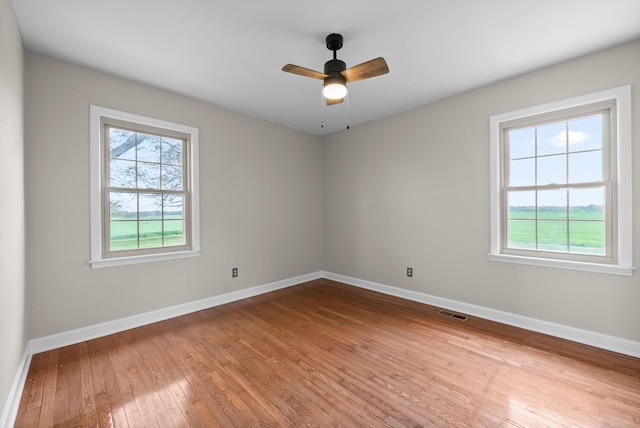 13391 Fruit Hill Red Bridge Rd, Crofton, KY 42217 - unfurnished room with hardwood / wood-style floors, visible vents, baseboards, and ceiling fan