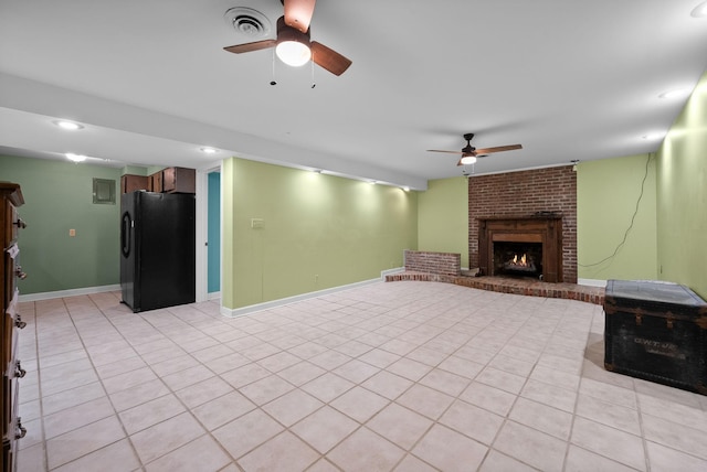 13391 Fruit Hill Red Bridge Rd, Crofton, KY 42217 - unfurnished living room featuring light tile patterned floors, ceiling fan, a fireplace, baseboards, and visible vents