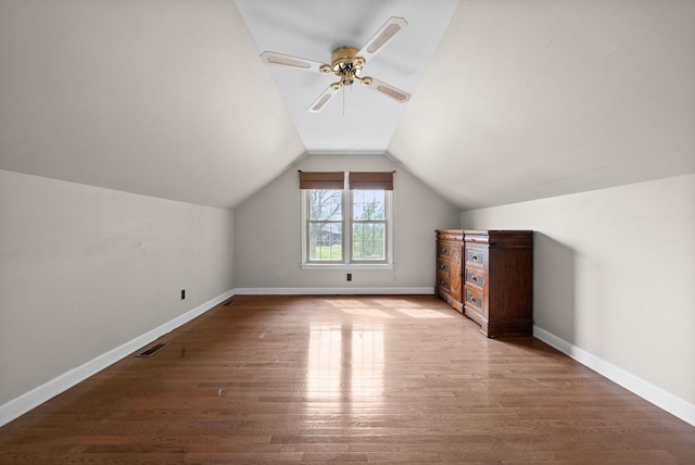 13391 Fruit Hill Red Bridge Rd, Crofton, KY 42217 - bonus room featuring lofted ceiling, wood finished floors, visible vents, baseboards, and ceiling fan