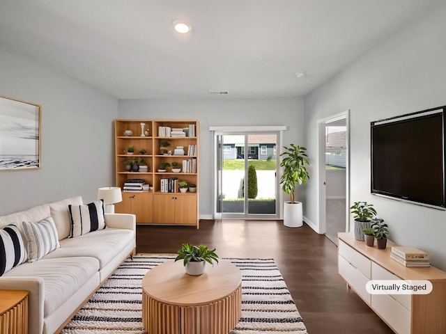 7007 Berkswell Dr, Lebanon, TN 37087 - living area with dark wood-style floors, baseboards, visible vents, and recessed lighting
