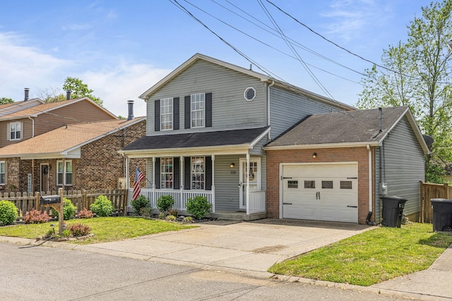 traditional-style house with brick siding, an attached garage, a porch, and fence