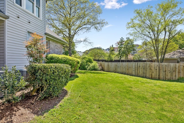 view of yard with fence