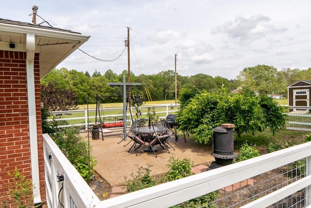 60 Sam Johnson Ln, Scotts Hill, TN 38374 - view of patio featuring fence
