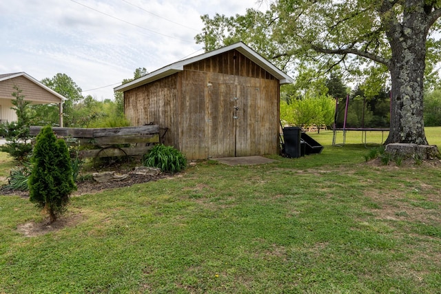 60 Sam Johnson Ln, Scotts Hill, TN 38374 - view of outdoor structure with an outdoor structure and a trampoline
