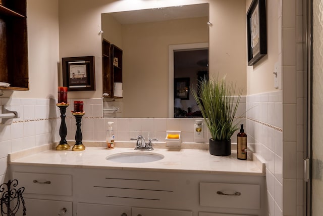 60 Sam Johnson Ln, Scotts Hill, TN 38374 - bathroom featuring tasteful backsplash, tile walls, and vanity