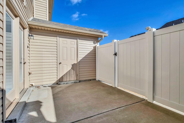 view of patio / terrace with a gate and fence