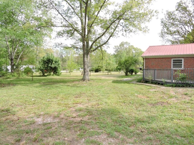 view of yard with a deck