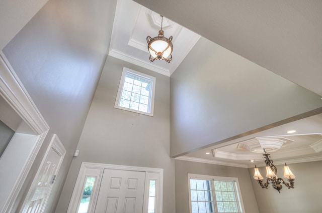 1178 Mccoury Ln, Spring Hill, TN 37174 - entrance foyer featuring an inviting chandelier, crown molding, and plenty of natural light
