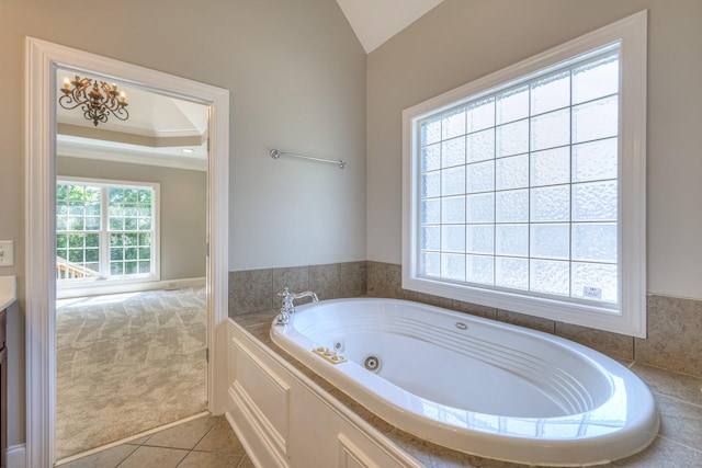 1178 Mccoury Ln, Spring Hill, TN 37174 - bathroom featuring crown molding, a whirlpool tub, tile patterned floors, and lofted ceiling