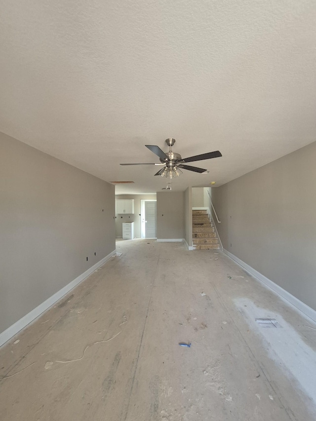 6 Hugh Hunter Rd, Oak Grove, KY 42262 - unfurnished room featuring stairs, ceiling fan, and a textured ceiling