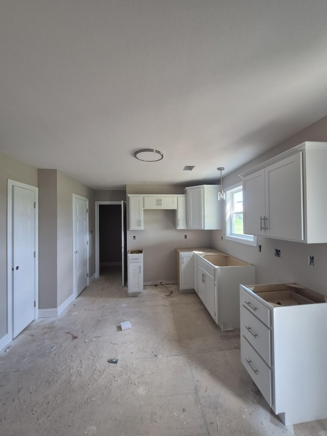 6 Hugh Hunter Rd, Oak Grove, KY 42262 - kitchen with white cabinets and decorative light fixtures