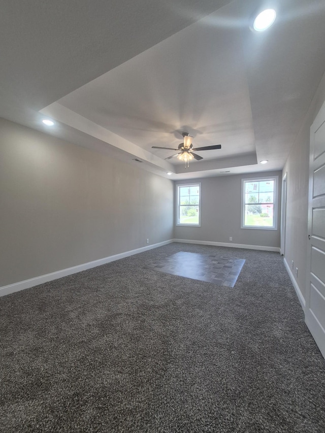 6 Hugh Hunter Rd, Oak Grove, KY 42262 - unfurnished room with a raised ceiling, dark colored carpet, a ceiling fan, and recessed lighting