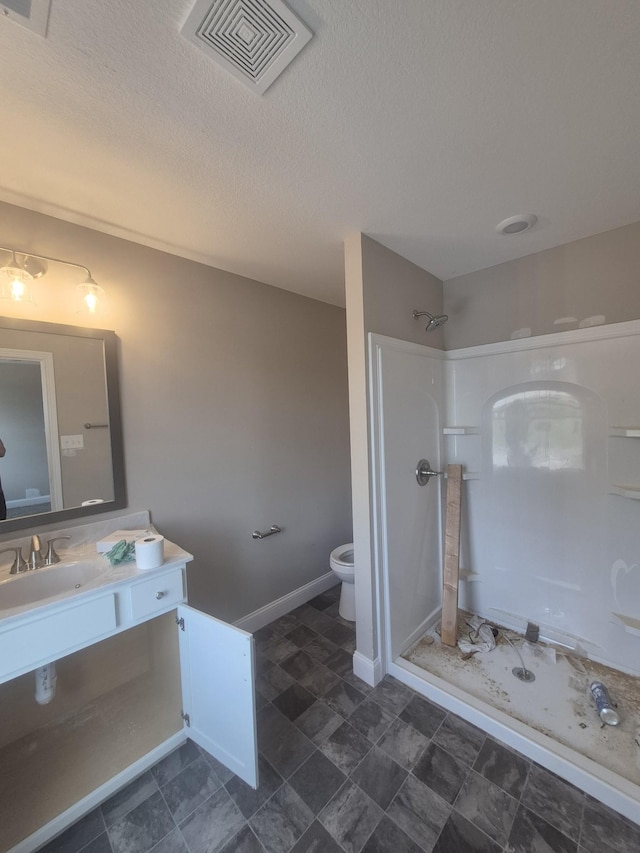 6 Hugh Hunter Rd, Oak Grove, KY 42262 - bathroom with a walk in shower, vanity, and a textured ceiling