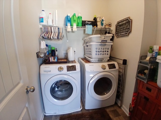 laundry area featuring washer and dryer and laundry area