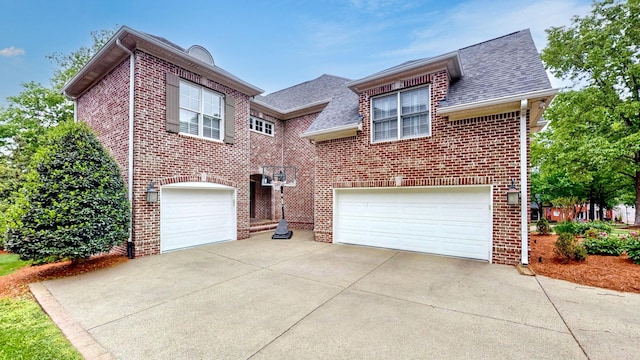 146 Allenhurst Cir, Franklin, TN 37067 - view of front of property featuring brick siding, a garage, a shingled roof, and concrete driveway