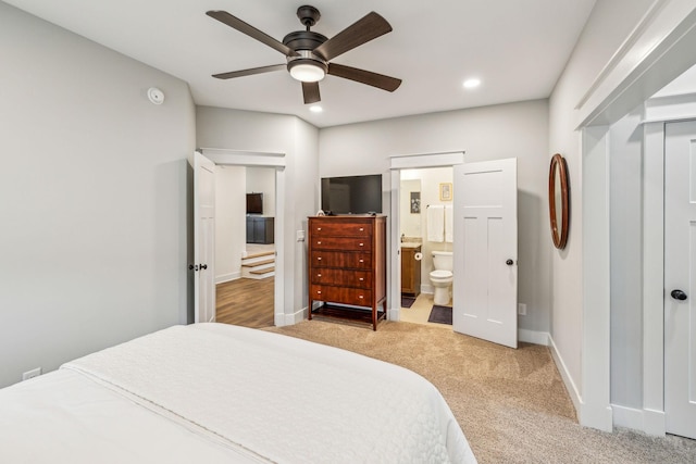 bedroom with a ceiling fan, connected bathroom, baseboards, carpet flooring, and recessed lighting