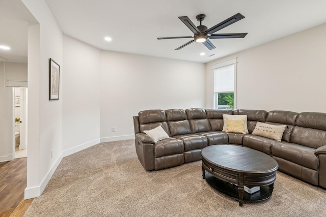 living room with a ceiling fan, baseboards, and recessed lighting