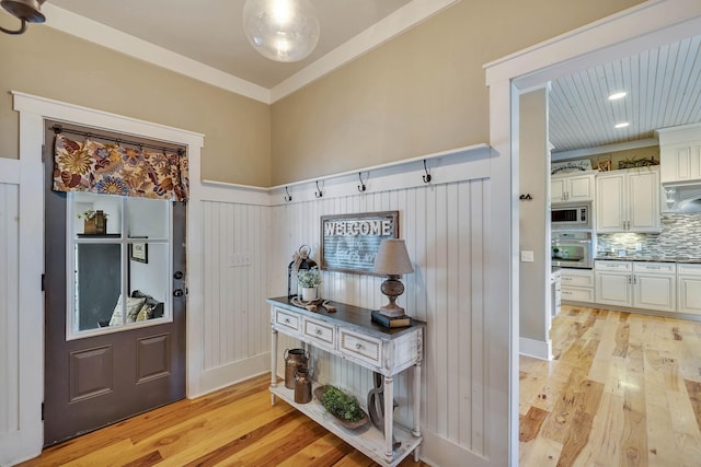 entryway featuring light wood-style flooring