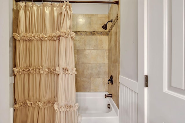 full bathroom featuring shower / bath combo with shower curtain