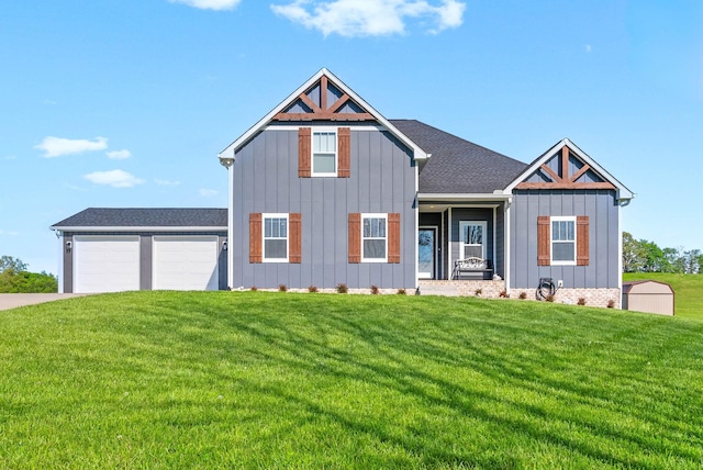 modern farmhouse style home featuring board and batten siding, an attached garage, a front yard, and concrete driveway