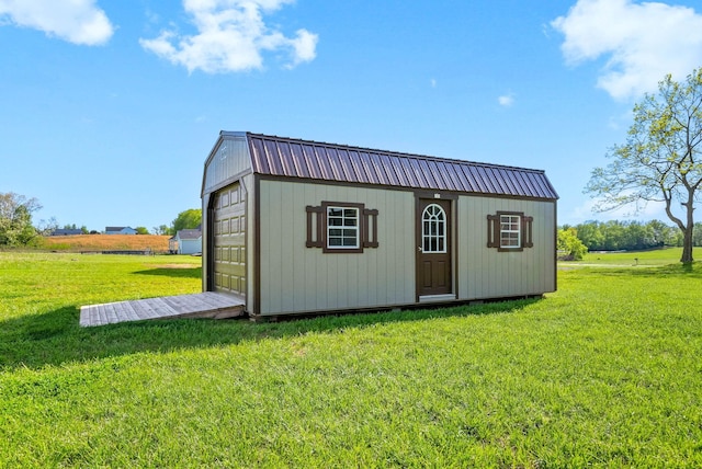 view of outbuilding with an outbuilding