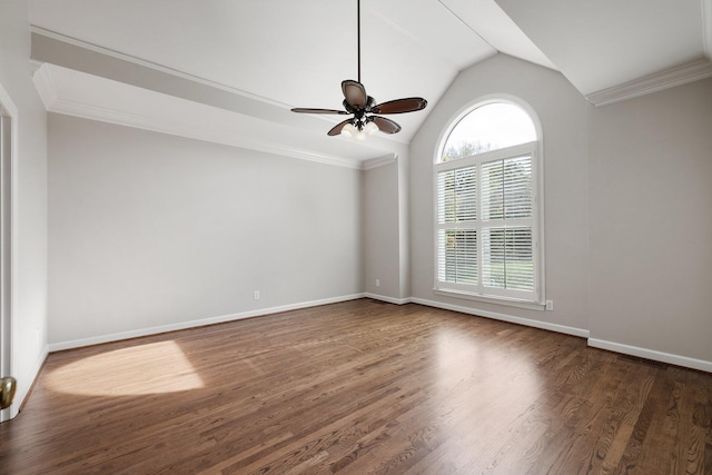 spare room with lofted ceiling, a healthy amount of sunlight, and ornamental molding