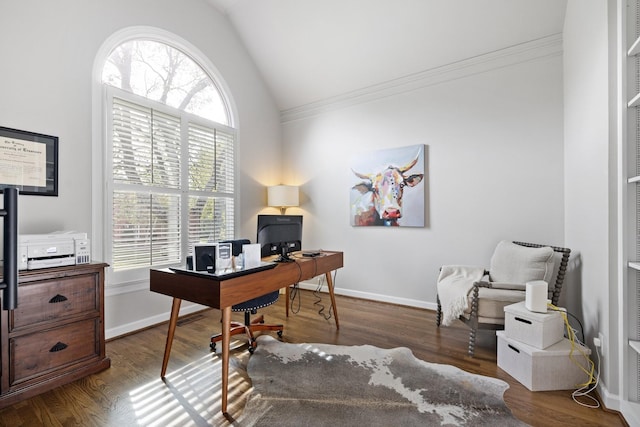 home office featuring lofted ceiling, crown molding, wood finished floors, and baseboards