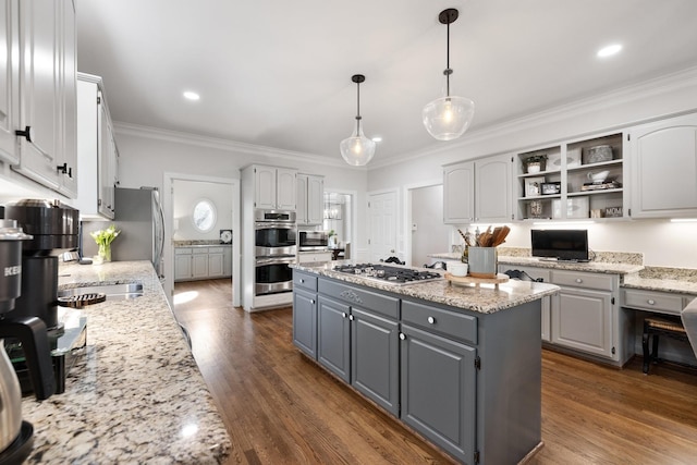 kitchen with a center island, open shelves, crown molding, stainless steel appliances, and gray cabinetry