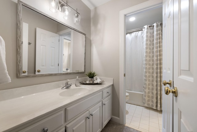 full bathroom featuring shower / bath combination with curtain, tile patterned floors, vanity, and toilet
