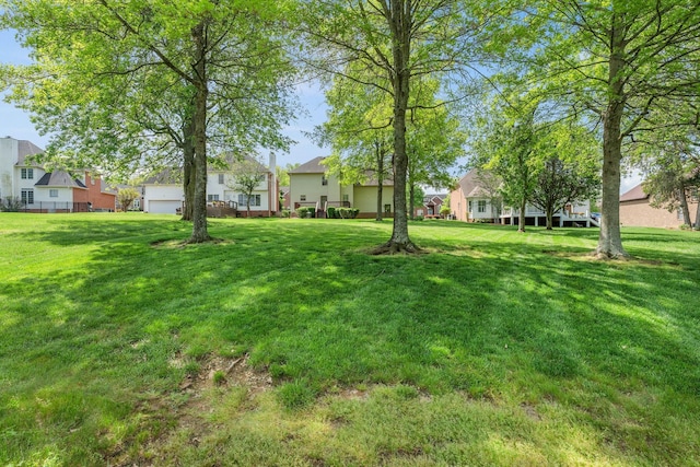 view of yard featuring a residential view