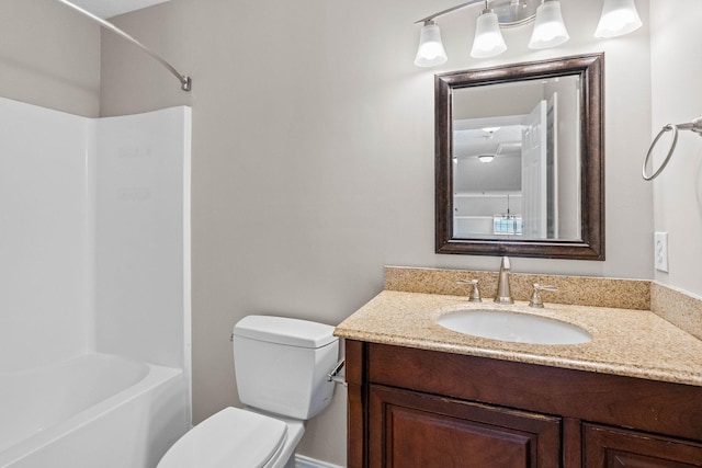 full bath with shower / tub combination, vanity, and toilet