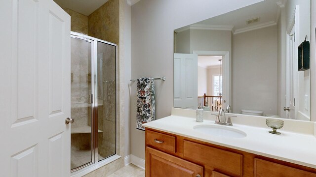 638 Band Dr, Franklin, TN 37064 - bathroom with ornamental molding, a stall shower, and vanity