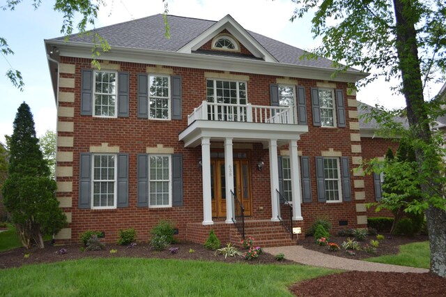 638 Band Dr, Franklin, TN 37064 - georgian-style home featuring a balcony, brick siding, and a shingled roof