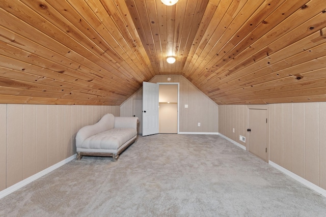 bonus room featuring wooden walls, vaulted ceiling, wooden ceiling, and carpet
