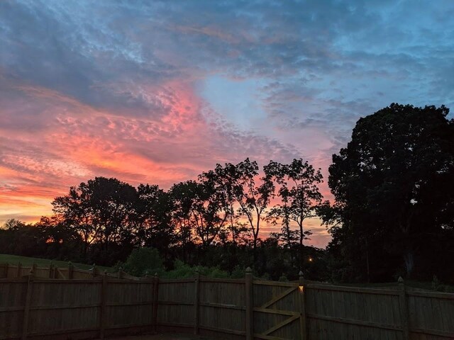 155 Telavera Dr, White House, TN 37188 - yard at dusk featuring fence