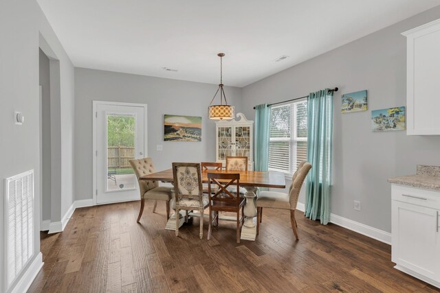 155 Telavera Dr, White House, TN 37188 - dining area featuring dark wood-style flooring, a healthy amount of sunlight, visible vents, and baseboards