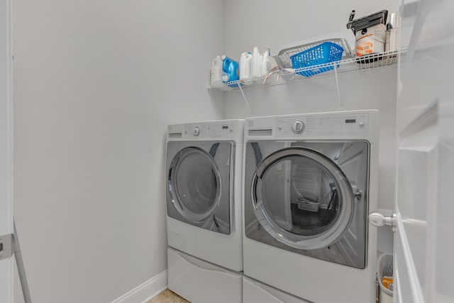 155 Telavera Dr, White House, TN 37188 - washroom with baseboards, laundry area, and washing machine and dryer