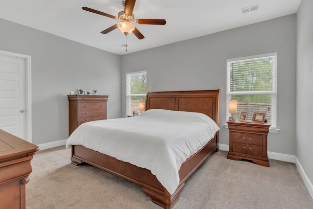 155 Telavera Dr, White House, TN 37188 - bedroom featuring visible vents, light carpet, a ceiling fan, and baseboards
