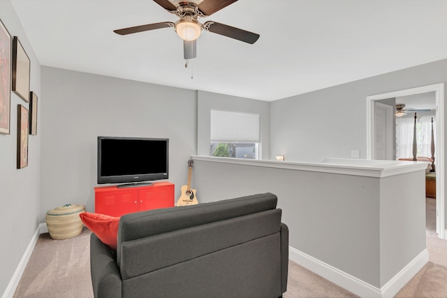 155 Telavera Dr, White House, TN 37188 - living area with ceiling fan, baseboards, and light carpet