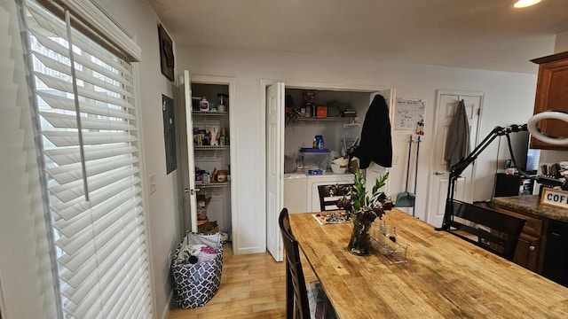 dining area featuring light wood finished floors and recessed lighting