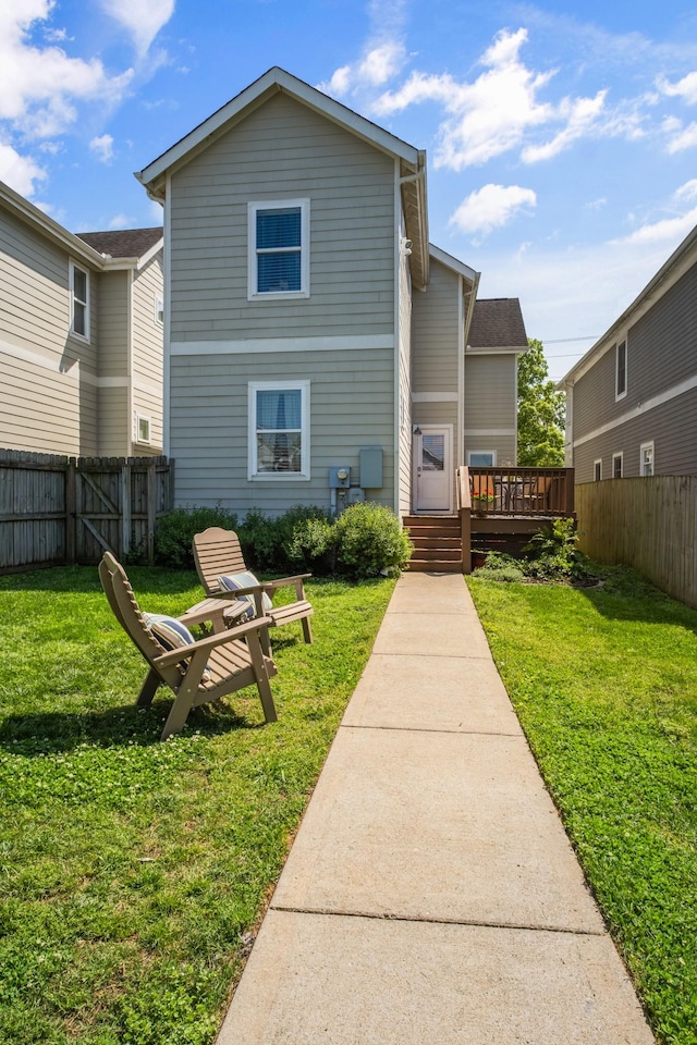 5604 Kentucky Ave, Nashville, TN 37209 - rear view of property with a wooden deck, a yard, and a fenced backyard