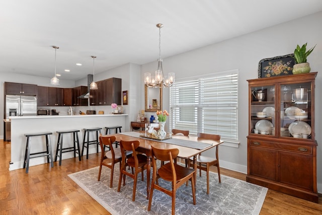 5604 Kentucky Ave, Nashville, TN 37209 - dining area featuring recessed lighting, an inviting chandelier, and light wood-style floors