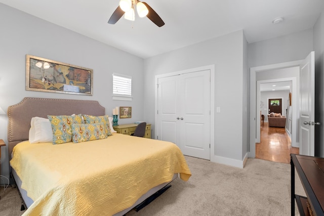 5604 Kentucky Ave, Nashville, TN 37209 - carpeted bedroom with baseboards, a ceiling fan, and a closet