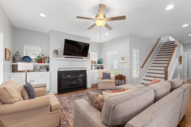 5604 Kentucky Ave, Nashville, TN 37209 - living room featuring recessed lighting, wood finished floors, ceiling fan, and stairway