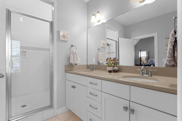 5604 Kentucky Ave, Nashville, TN 37209 - full bathroom with a sink, a shower stall, double vanity, and connected bathroom