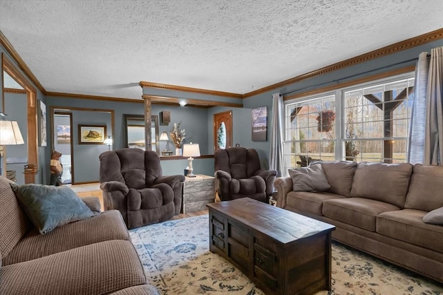 living room featuring light wood finished floors, a textured ceiling, and crown molding