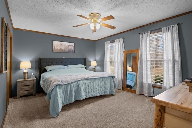 carpeted bedroom featuring a textured ceiling, crown molding, and a ceiling fan