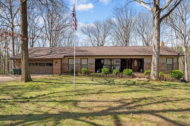 ranch-style home featuring a front lawn, driveway, a porch, brick siding, and a garage