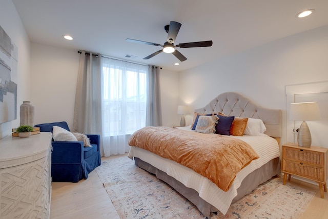 bedroom with recessed lighting, a ceiling fan, visible vents, and light wood-style flooring